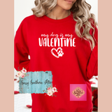 Red sweatshirt with 'my dog is my VALENTINE' text and paw print, worn by a person.